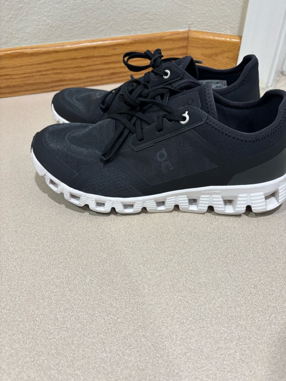 On Running Women's Black Athletic Sneakers with White CloudTec Sole